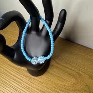 Glass Beaded Elastic Bracelet Blue with Acrylic Medallion Rounds